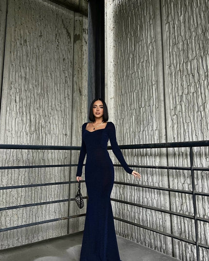 MAXI DRESS MADE OF SUBTLE GLITTER FABRIC